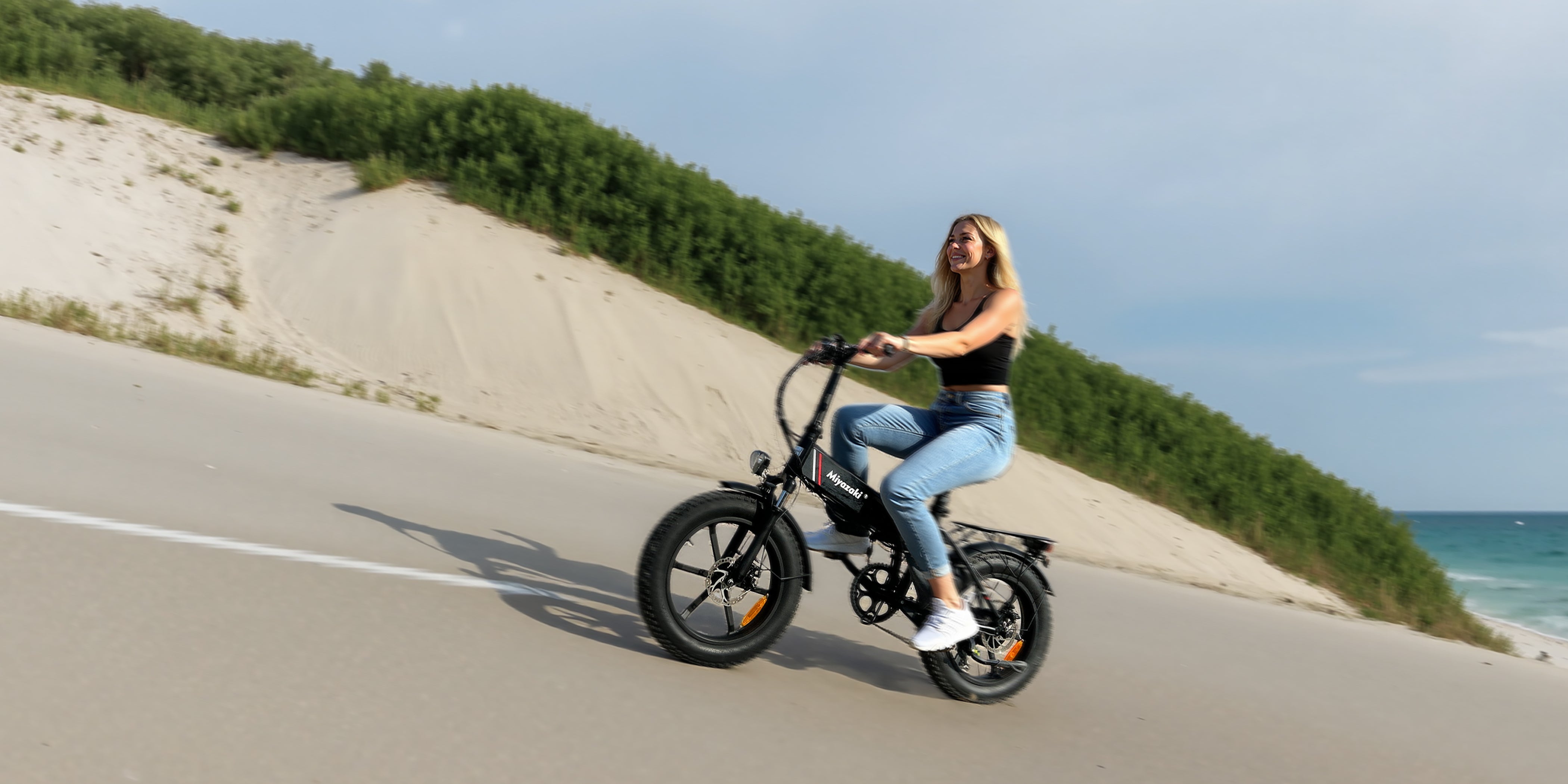 R5 electric bike climbing steep hills effortlessly with 672Wh battery and high-torque 80Nm motor